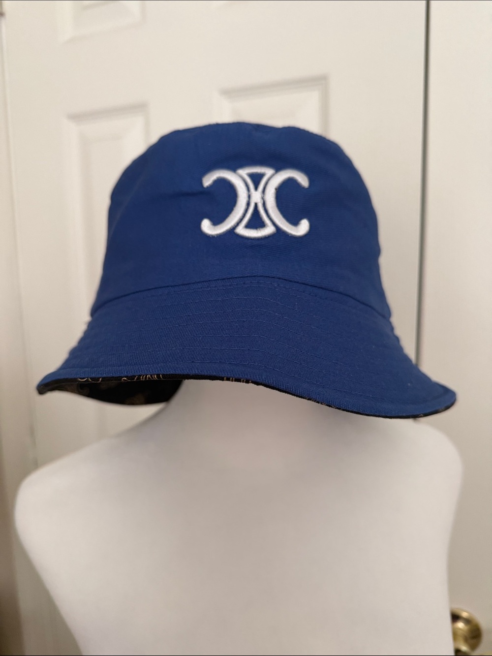 Bucket blue Hat with White Interlocking Logo